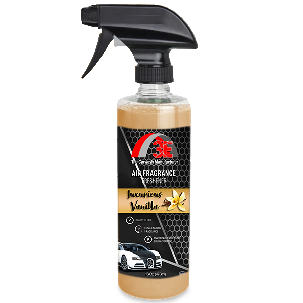 Luxurious Vanilla Air Freshener spraying in a car, creating a warm and inviting scent.